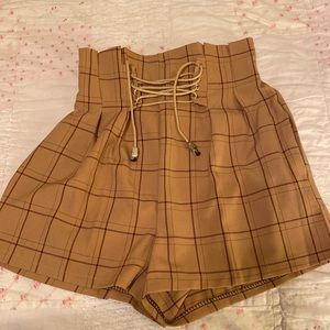 Tanish yellow plaid high waisted shorts. Size S. Corset tie.
